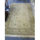 A Marks & Spencer's Egyptian, New Zealand wool rug with floral designs, multi guard borders and