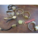 The component parts of ladies wristwatches and a fob watch