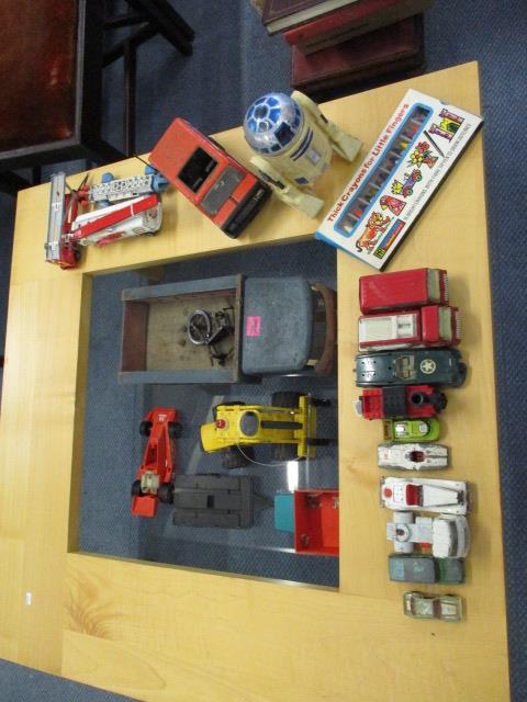 A selection of toys to include a model R2D2, a Dinky Toys Mercedes Benz, a wooden truck and other