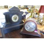 A black marble clock A/F, together with an early 20th century oak cased mantle clock, also A/F