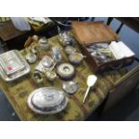 A mixed lot of silver plate to include entree dishes, a barometer, a three-piece tea set, two enamel