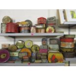 A quantity of vintage tins to include biscuit tins, commemorative tins and late 20th Century tobacco