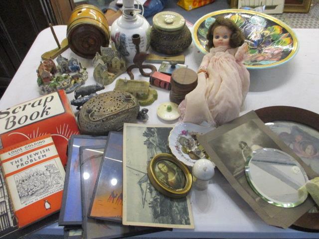 A Peter Rabbit ceramic table lamp, ephemera, Danbury Mint cottages, a vintage doll, a small amount