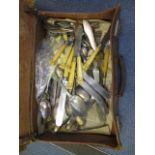 Silver plated cutlery to include dinner knives and forks, spoons and other cutlery, all contained in