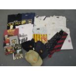 A collection of commemorative clothing, CDs, DVDs and other items to include The Beatles and MMC