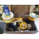 A box containing miscellaneous cleaning products for metalware and wooden items