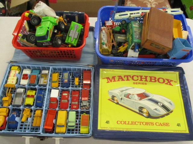 A collection of toys cars to include two Matchbox series collectors cases containing mixed