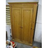 A modern pine double wardrobe, 80" h x 50" w