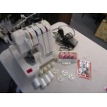 A baby Lock Prestige model 750 DS dress making machine, with additional thread