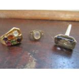 An 18ct gold ring set with six coloured cabochons and two 14ct gold rings