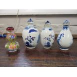 Four modern Chinese perfume bottles, three ceramic and the other glass with painted decoration