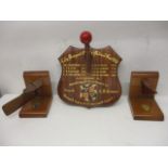 1950s Racing rowing boat related items to include a rudder and bow section bookends and the prow