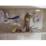 Ornamental birds on stands, pottery bird models and a Victorian stoneware bottle