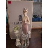 A Lladro figure of a Touch of Class lady, 15" h