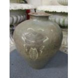 A stoneware vase decorated with two bugs