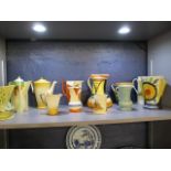 An assortment of jugs to include an Art Deco Royal Doulton jug, a Myott and Sons jug and others