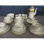 A Cauldron china part coffee set and a Collingswood part teaset