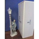 A Lladro Lamplighter figure