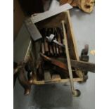 A selection of 19th century woodworking tools to include a Calloway & Co plane, saws, planes and