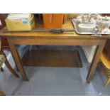 An early 20th century oak extending dining table, 29 1/2" h x 42" w