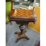 A William IV rosewood gaming table with work box and a fitted interior, 28 3/4" h x 17 1/4"w