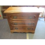 A continental chest of three long drawers, 29" x 33" x 18"