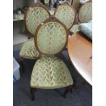 Six walnut framed, French style dining chairs with cabriole front legs, sabre reverse, pierced,