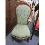 A Victorian spoon back nursing chair