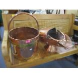 A brass and copper coal bucket