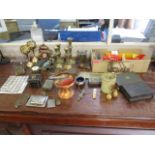 A miscellaneous lot to include brass candlesticks, a silver cigarette case, a Frog Buccaneer model