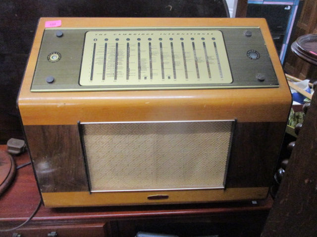 A Cambridge International radio in a walnut and satinwood case