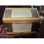 A Cambridge International radio in a walnut and satinwood case