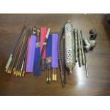 A mixed lot of chop sticks and white metal smoking pipes to include a white metal document holder