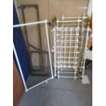 A late Victorian white painted metal and brass cot