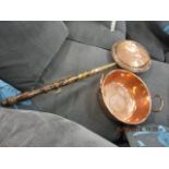 A mid 20th century copper jam pan, a bed pan and a scuttle