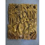A modern Indonesian treen carved plaque, 18 1/2" x 14 3/4"