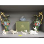 A pair of early 20th century urns, two Hummel models of animals and others and a figure of a lady