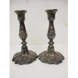 A pair of Victorian silver candlesticks by Henry Wilkinson & Co, Sheffield 1852, with fixed acanthus