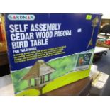 A self assembly cedar wood pagoda bird house