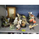 A selection of model animals to include a Royal Doulton cat, Border Fine Art birds and other items