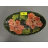 A Moorcroft coral hibiscus oval dish, 9" long