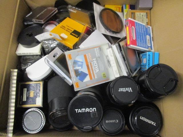 A selection of mixed camera lenses and filters