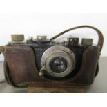 An early 20th century Leica 111 camera, serial number 234766 with a Leitz Elmar 1:35F 50mm lens,