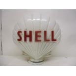 A Shell white and reg glass petrol pump globe