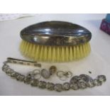 Silver to include a tie clip, a pair of cuff-links, a pair of earrings, a bracelet and a hair brush