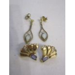 Two pairs of 9ct gold earrings, one set with opals