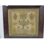 A large William IV sampler with a tree, birds and deer flanked by birds and potted flowers and a