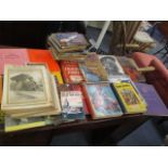 An assortment of books and magazines to include 'The War Illustrated', 'Every Boys Hobby Annual' and