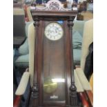 A mahogany cased wall clock