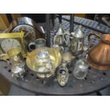 A mixed lot to include two clocks, a Victorian copper jug and mixed silver plate